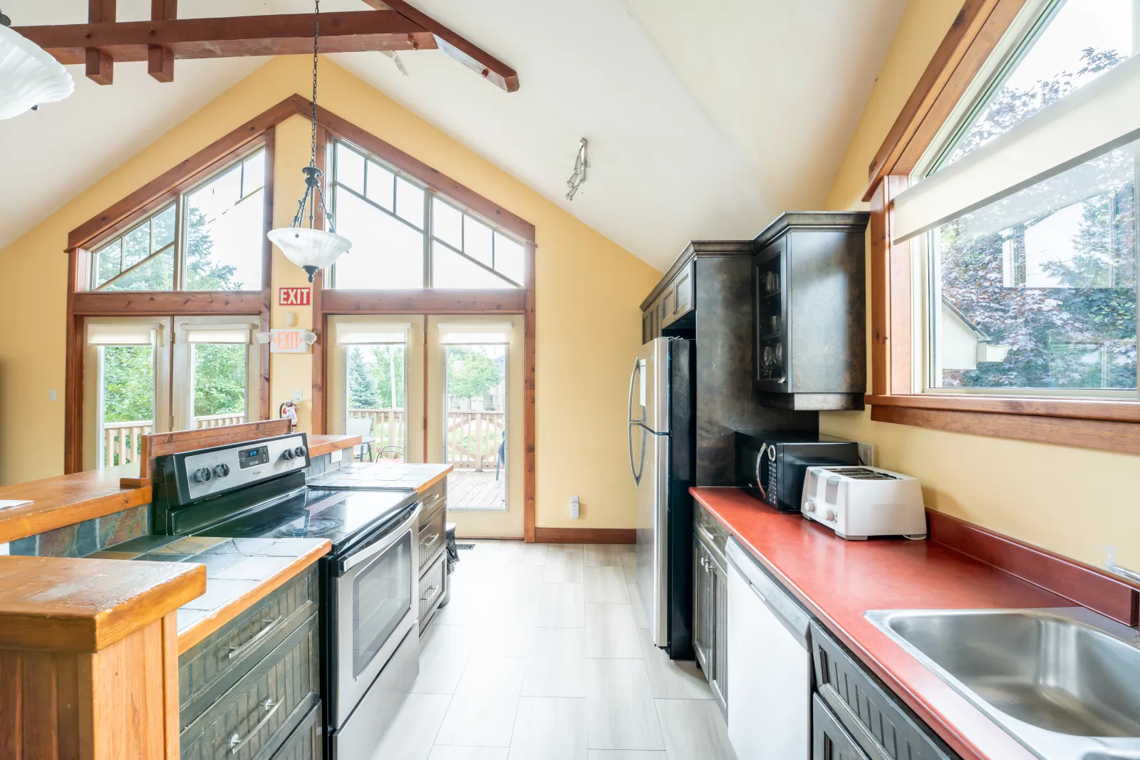 The Aurora gallery: kitchen range, sink and dishwasher along the window wall