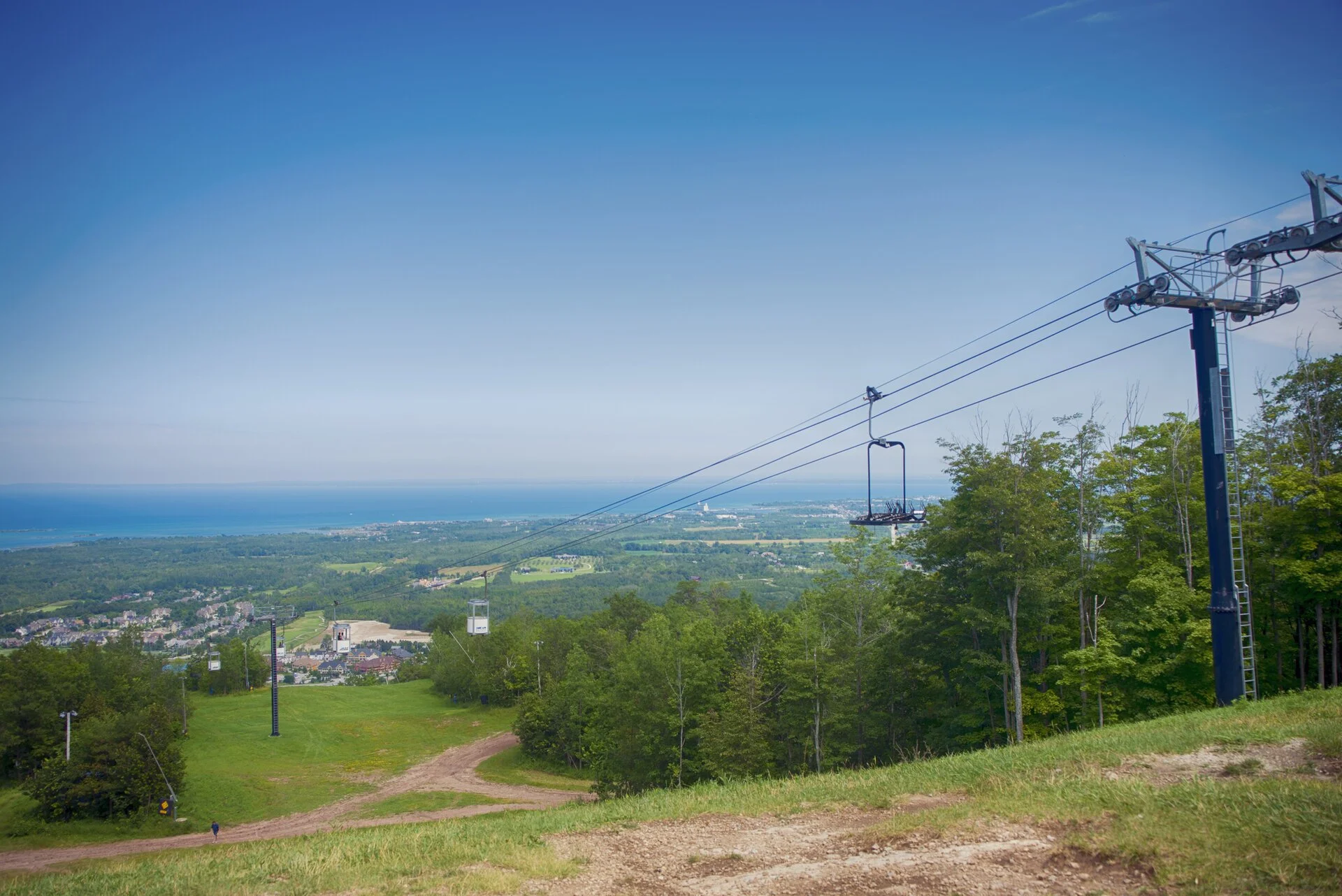 Summer chairlift view to Georgian Bay