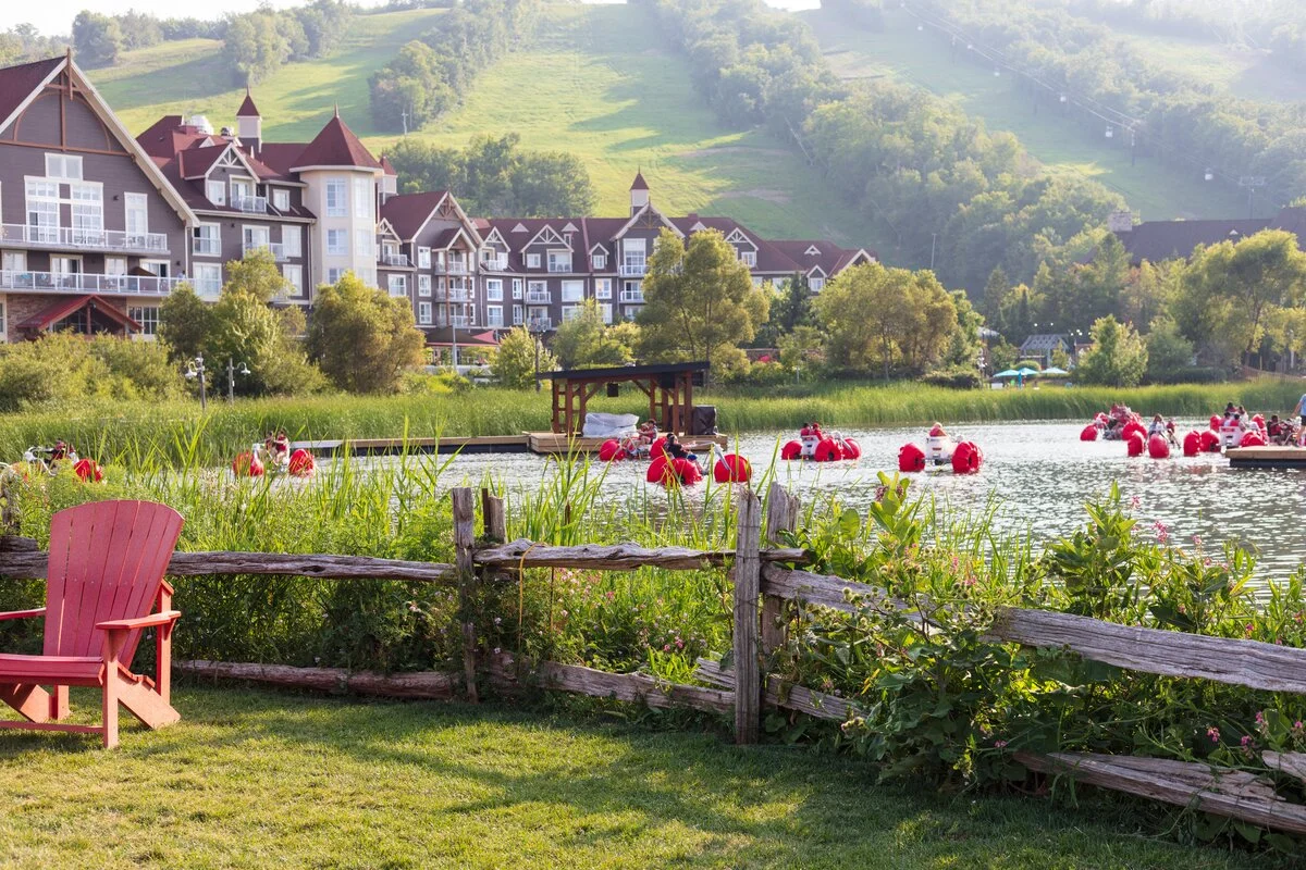 Blue Mountain Village in summer with paddle boats